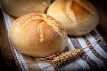 Several kaiser rolls.