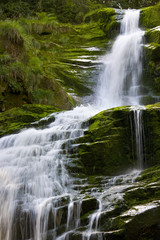 Fototapeta premium Poland. The Karkonosze National Park (biosphere reserve) - Kamienczyk waterfall (fragment)