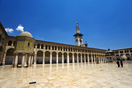 Syria. Damascus. Omayyad Mosque - northern part of courtyard with the Dome of the Treasury on left side and the Minaret of the Bride in the middle