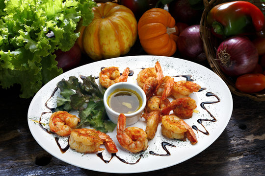 Haute cuisine, large shrimp with sauce