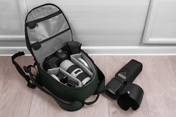 Photographer's equipment on the floor in a room