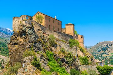 Citadel built on top of a hill in Corte town, Corsica island, France - obrazy, fototapety, plakaty