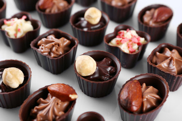 Delicious chocolate candies background, close up