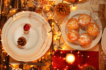 Christmas table setting with holiday decorations