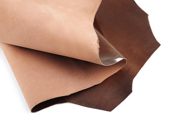 Dark brown leather on white background, close up