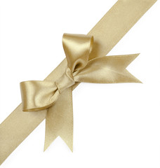 Gold ribbons with bow isolated on white background