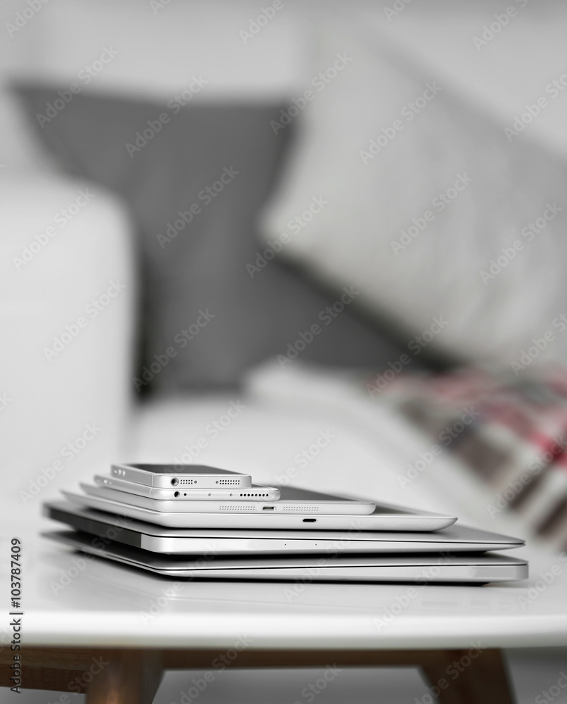 Poster Pile of electronic gadgets on the table. Communication and technology concept