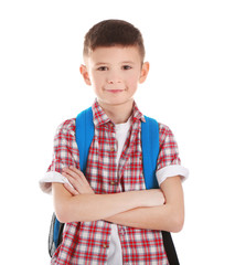 Portrait of little boy with back pack, isolated on white