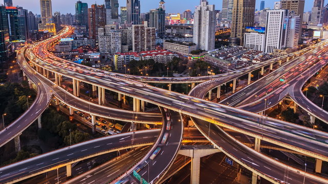 4k (4096x2304) : Aerial view of freeway, busy city rush hour heavy traffic jam highway,Shanghai,China. From day to night time-lapse.
