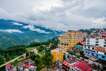 Sa Pa city view with mountain range background