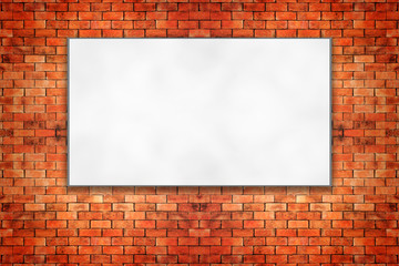 Blank folded paper poster hanging on brick wall