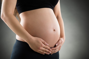 Mid Section Of Pregnant Woman