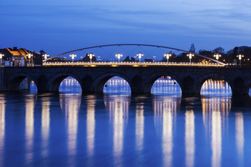 Fototapeta na wymiar Bridge on Meuse River in Maastricht