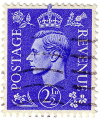 UNITED KINGDOM - CIRCA 1937: Postage stamp printed in England (Perfin "CA"), shows King of the United Kingdom and the Dominions of the British Commonwealth, George VI, circa 1937