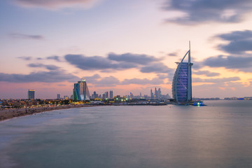 Fototapeta premium Burj Al Arab and Jumeirah Beach Hotel at the sunset