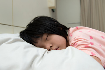 Obraz na płótnie Canvas Asian child sleeping