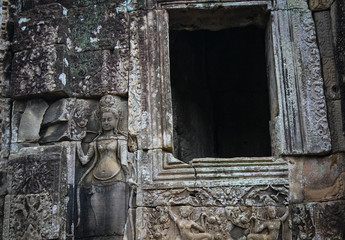 statue Bayon Temple Angkor Thom, Cambodia. Ancient Khmer architecture.