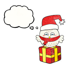 thought bubble textured cartoon cute christmas owl on gift