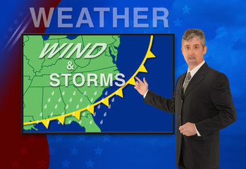 A tv television news weather meteorologist anchorman is reporting with a Wind & Storm graphic over...