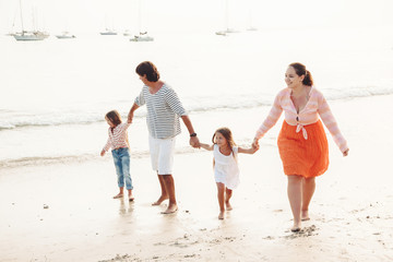 Family on the evening beach