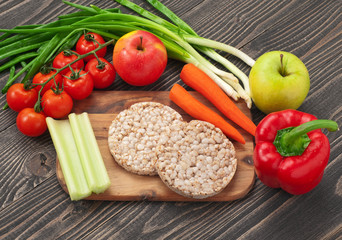 Healthy organic vegetables and diet rice cakes