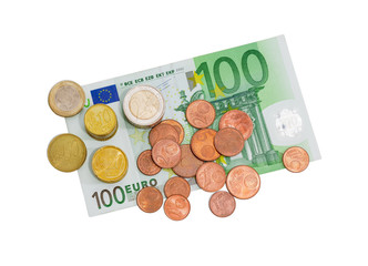 Euro coins on the background of banknote of 100 euro