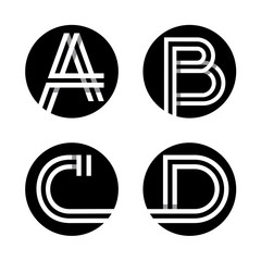 Capital letters A, B, C, D. From double white stripe in a black circle.