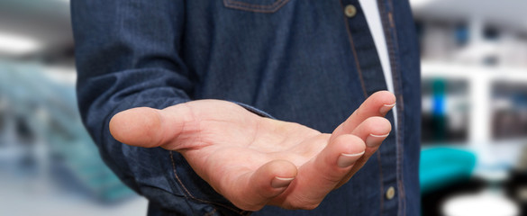 Young man on office background