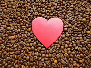 Coffee grains fill up heart.