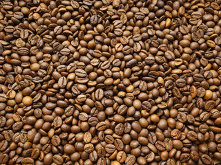 Coffee beans background. Roasted coffee beans for pattern and background.