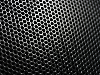 Mesh background. Meshy metal structure with shallow depth of field.
