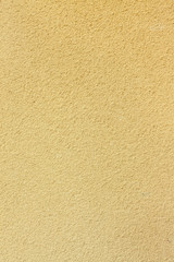 Yellow plaster wall texture