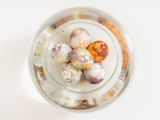 Easter eggs in glass bowl