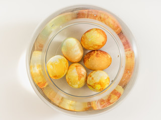 Easter eggs in glass bowl