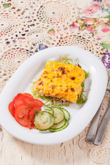 fish with cheese sauce and vegetables Serving Table