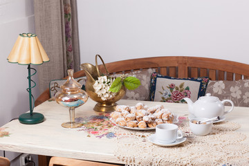 beautifully decorated table with tea and biscuits