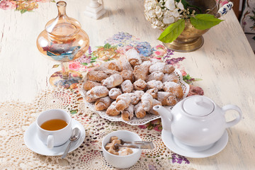 beautifully decorated table with tea and biscuits