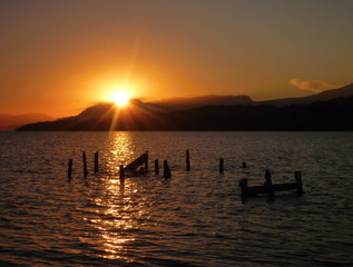 beautiful romantic sunrise at lago villarica in chile