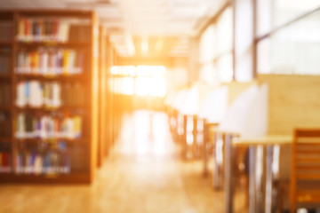 Blur image of picture library background. Library resources, including vast knowledge and sun light. School classroom in blur background. blurry view of elementary class room. - Powered by Adobe