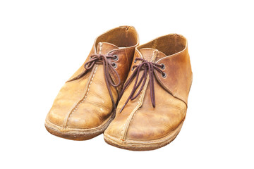 Old brown leather shoes isolate on a white background.