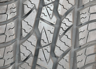 grey black tire tread area(center of frame is selected focus)