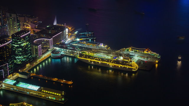 night light city cruise dock 4k time lapse from hong kong city bay

