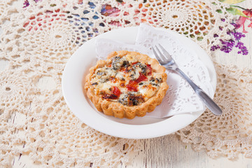 tartlet with eggplant, cheese and vegetables