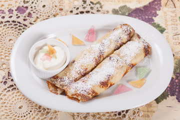pancakes with powdered sugar marmalade