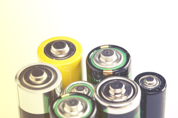 Stack of different used batteries