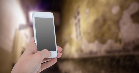 Composite image of woman showing smartphone 