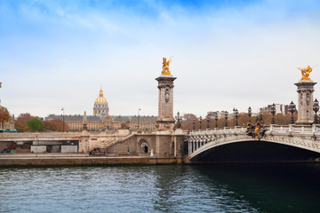 Fototapeta na wymiar Alexandre III Bridge and Invalides view in Paris, France