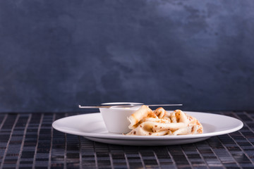 Pancakes with butter on dish in restaurant. Place for your text