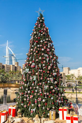 Naklejka premium Burj Al arab and Christmas tree