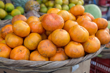 fresh mandarin group on basket from market